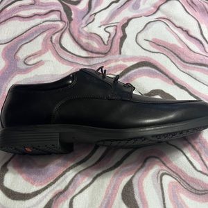 Mens black Rockports size 12 hydro shield water proof shoe.